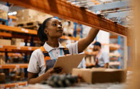 black-female-worker-checking-inventory-on-shelves-2022-11-29-22-44-05-utc