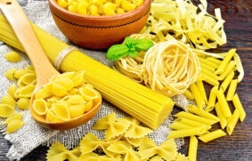 pasta-different-with-basil-on-dark-board-2021-12-14-02-31-51-utc